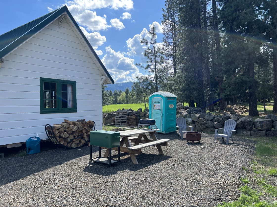 Outdoor space! Porta potty for your use and picnic table, propane grill and fire pit (only permitted when not in a burn ban). 