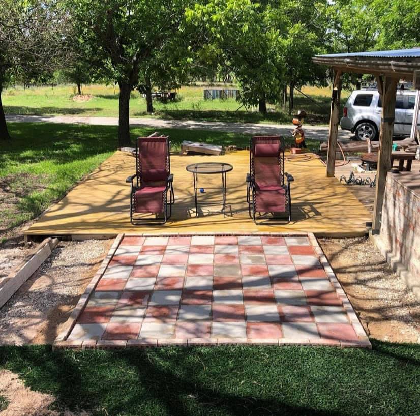Uncovered patio and sport court and a great big checkers board!
