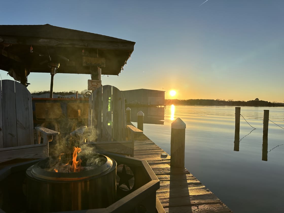 Enjoy sitting around the Solo firepit on Adirondack chairs watching the sunset