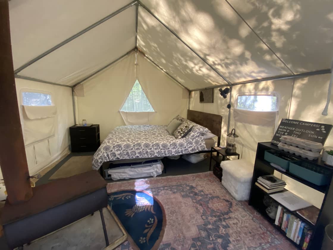 Fully furnished canvas tent with wood stove. 