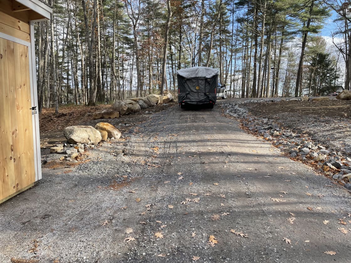 Backing your RV down into your campsite will not be an issue with our 12 foot wide crushed granite and flat driveway.