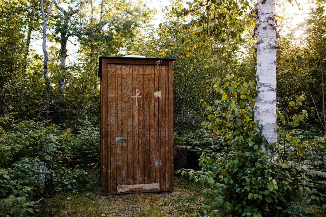 Each wall-tent has it's own, private outhouse. We empty outhouses regularly between guests, so they stay relatively low-odor. 