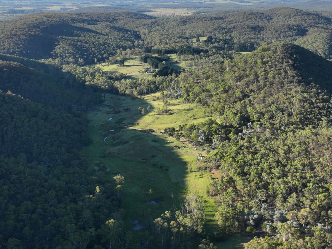 The waterholes along Lyrebird Creek glint in the early morning shadows of our 1 km long valley
Our northern boundary is 2.1 kms, southern 5.6kms