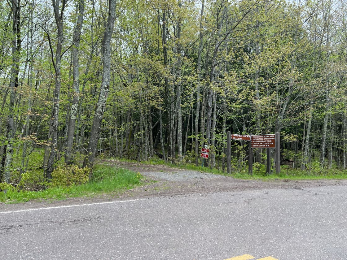 Our turn is at the very end of County Road 519, right next to the trail signs, just before the entrance booth to the Presque Isle Scenic Area