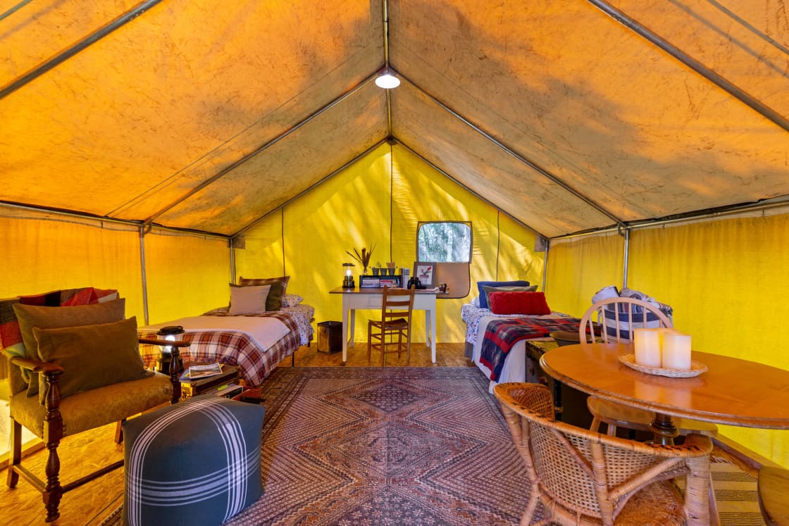 The tent can be setup with two twin XL beds OR one king.