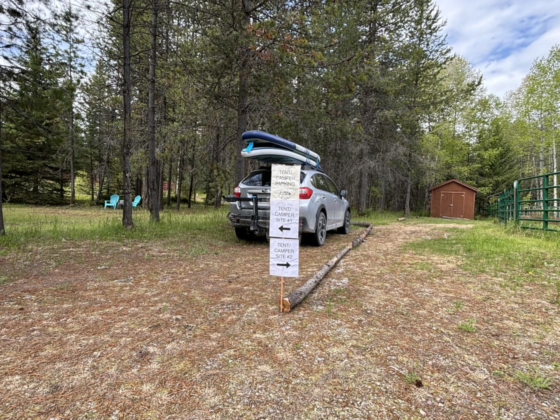 Site #1: park on the left side of the sign/divider (where the vehicle is parked in this picture). Your campsite is immediately to your left. 
