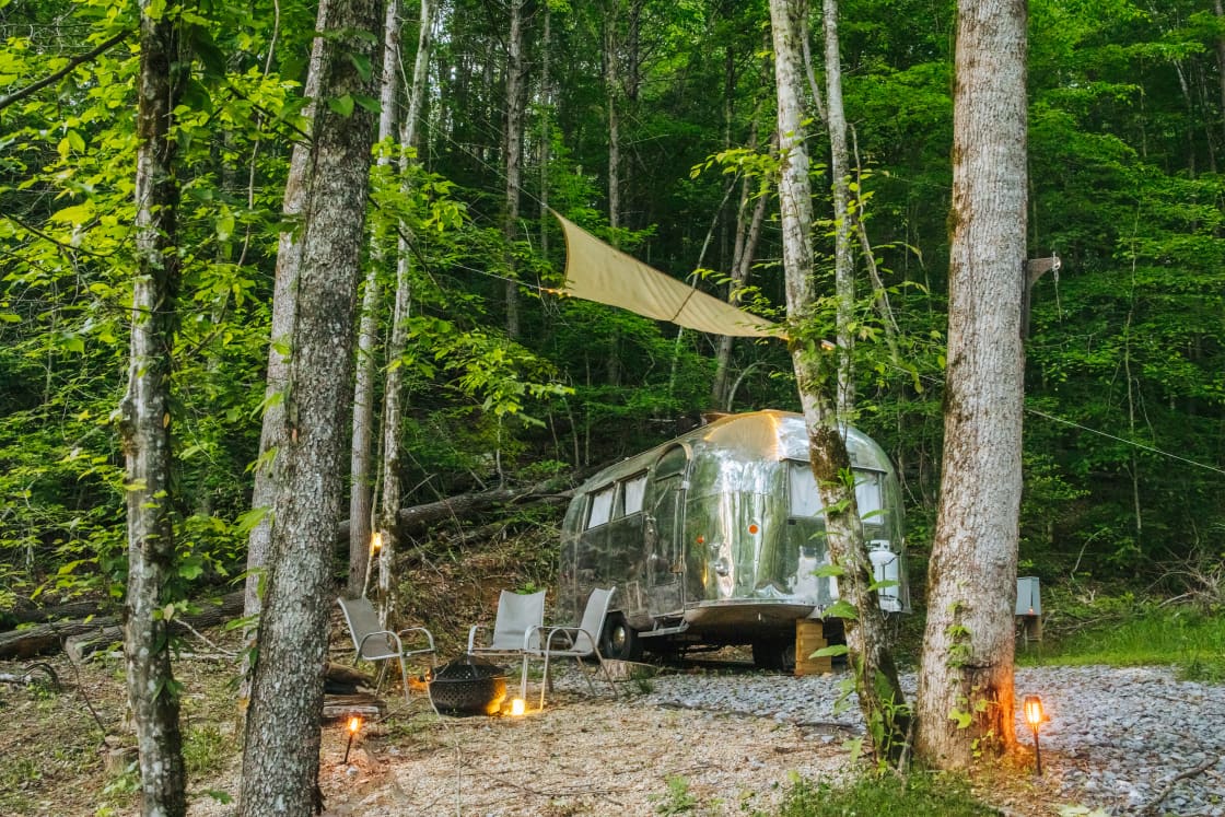 The Shiny Tiny Airstream sits at the top of the properties right next to the trail. 