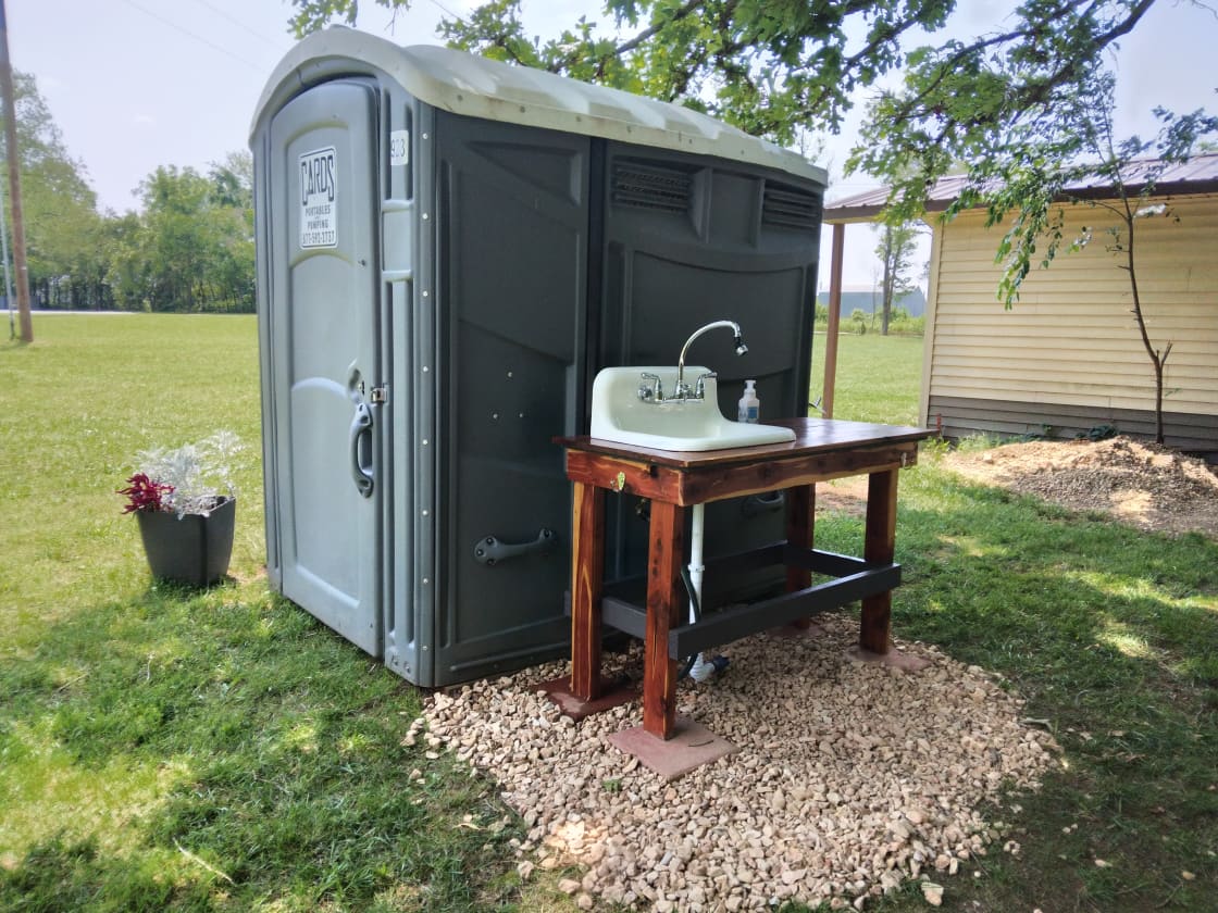 The bathroom facilities located near the front of the property.  Closest to campsite 1 and some of the dispersed campsites.  