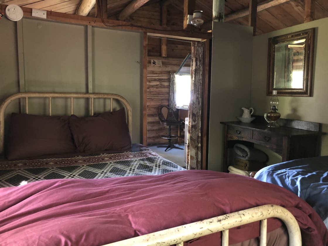 The cabin has two bedrooms each with a full size & twin size bed.  Bedding is included