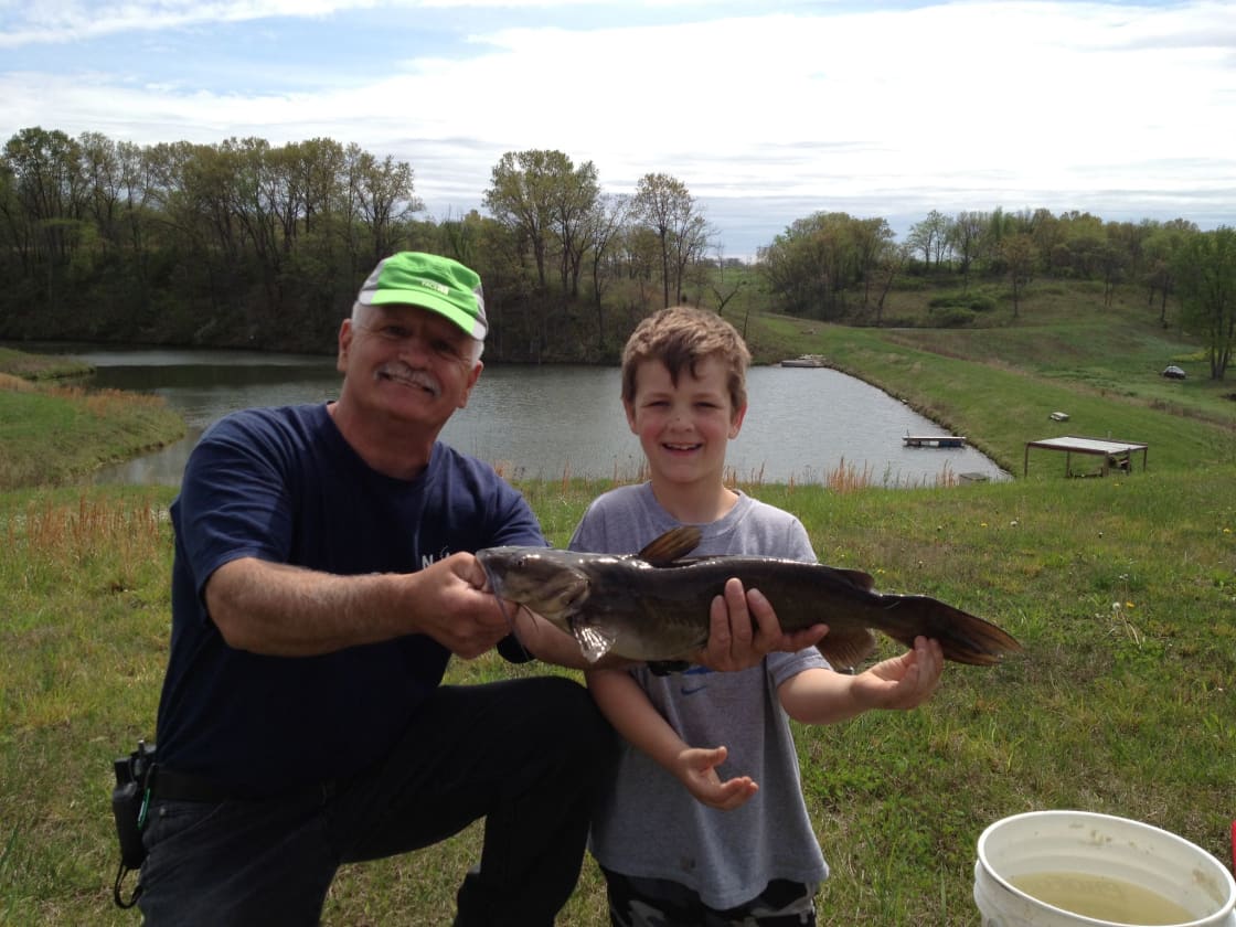 If you and your family love fishing, this is a great place to bring kids.  The fish are always biting which makes your adventure fun for all.   This fish was caught in Pond 2 which is over the hill from the pond visible in this picture (Pond 1).   