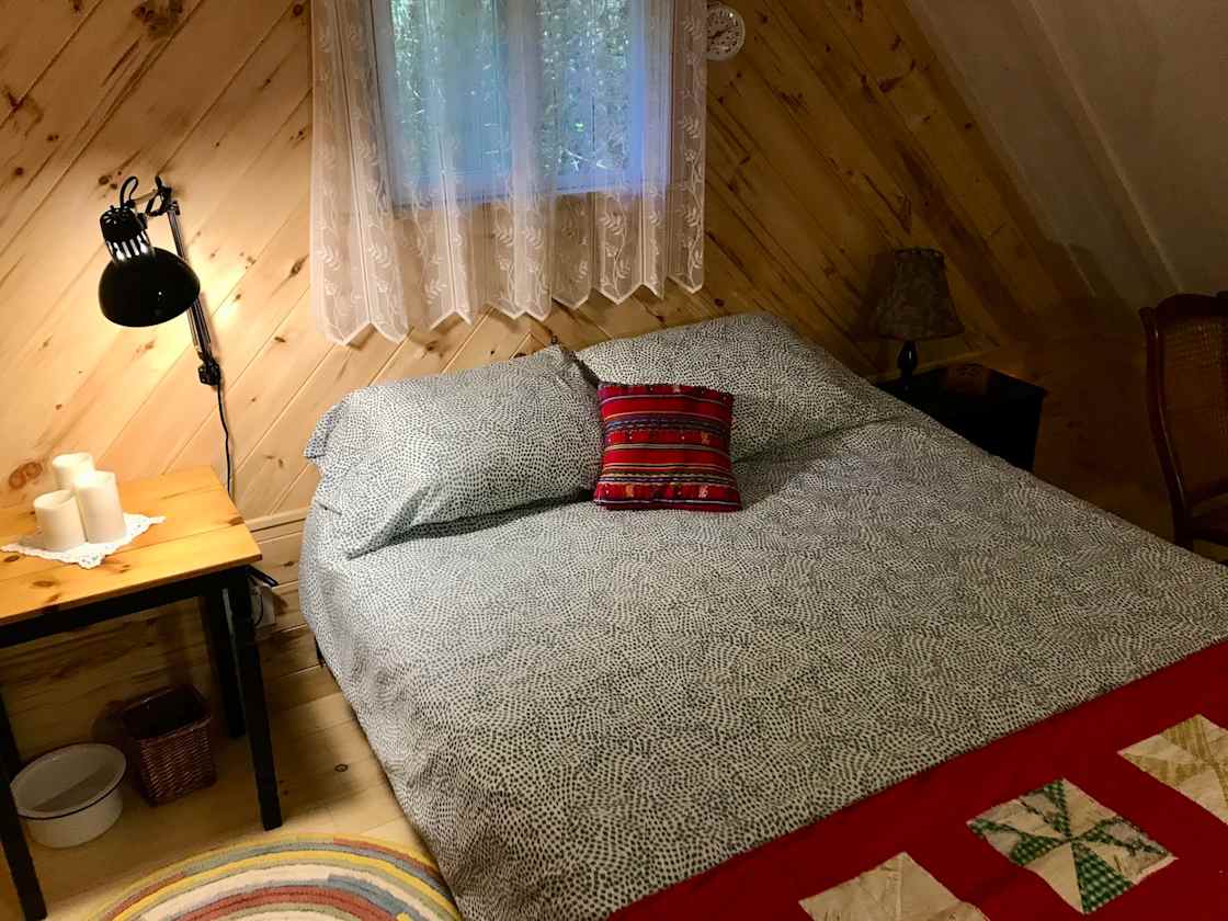Queen-sized bed in loft. Rocking chair and extra blankets to keep you comfortable.