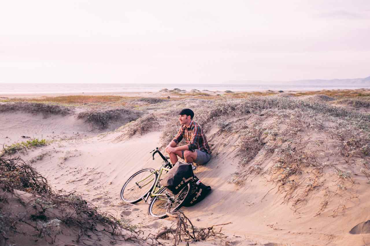 After miles and miles of asphalt, we cracked a beer and watched the sun set behind Morro Rock. Moments like this make the ride what it is. 