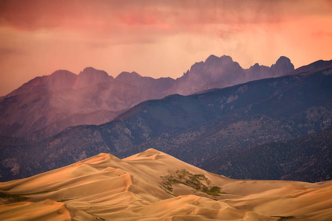 This was taken (with a 400mm lens) in the parking lot at the store below the campground. The sand dunes sit on the west edge of the Sangre de Cristo mountains and so see some pretty awesome sunsets.