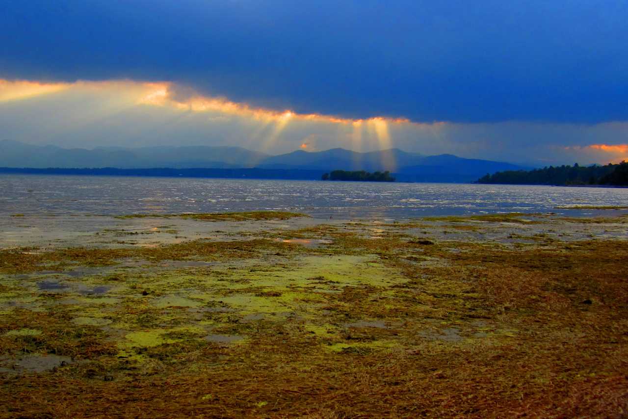 The best sunsets over the Adirondacks - The beach at Button Bay Campground.