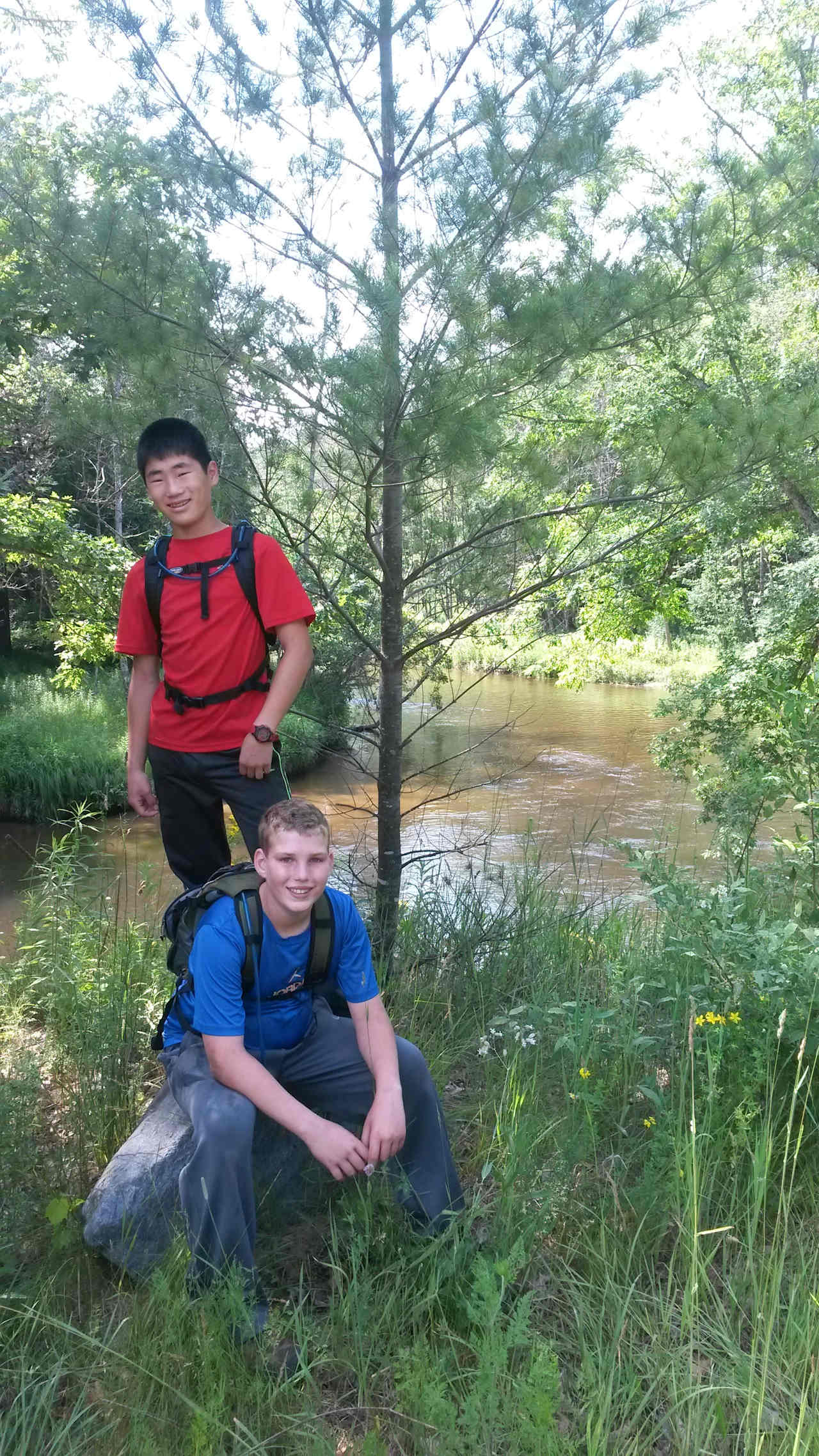 Boys along PM River