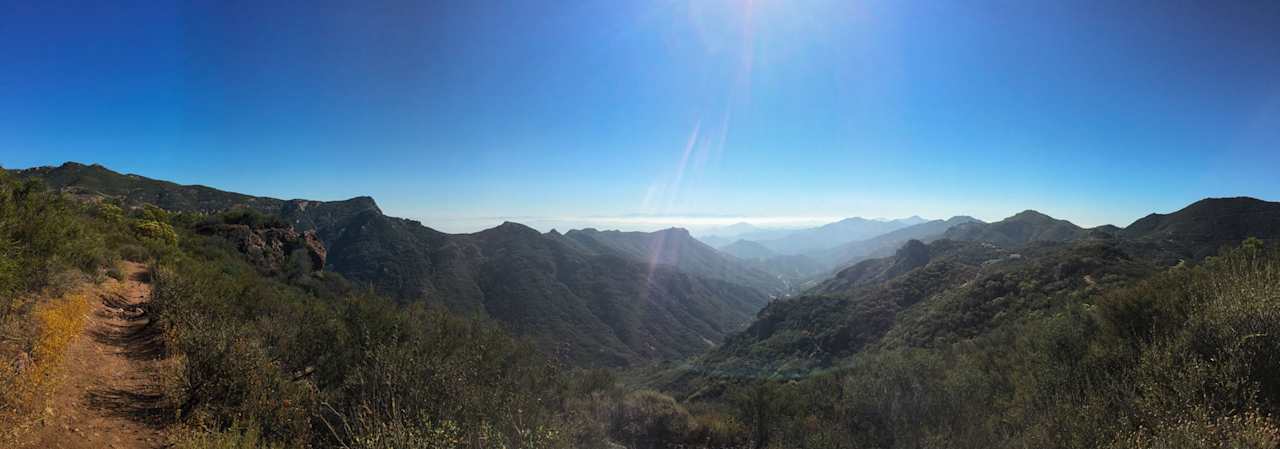 Mountains cascading in the marine layer in the early morning