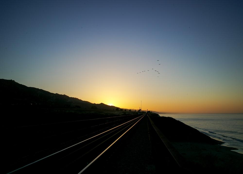 Probably a non-sanctioned trail, but you can hike up to the railroad track from the side of hill.