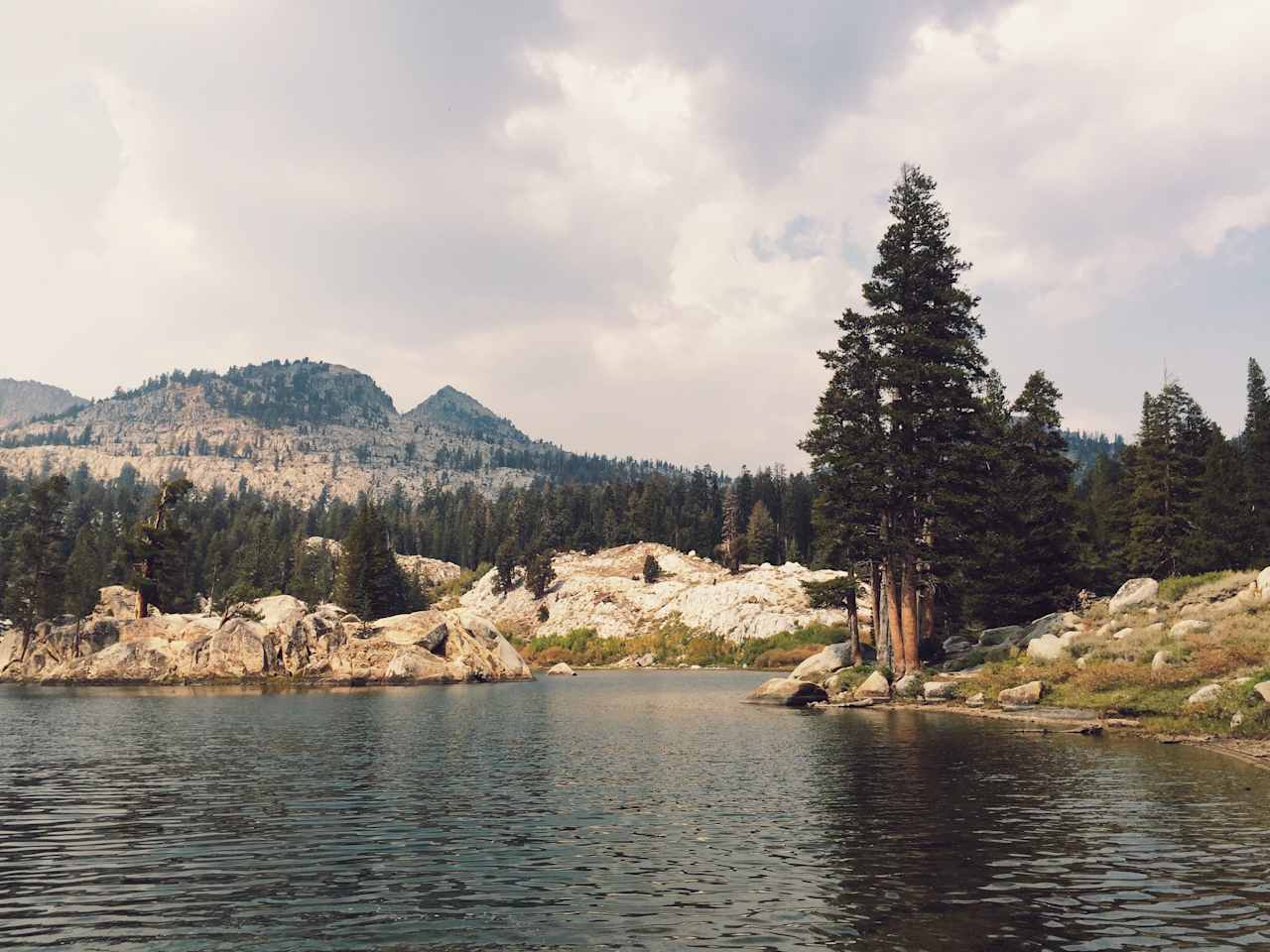 Upper Twin Lake on a smoky afternoon. The lake is a little over three miles' hike from the Sample Meadow trailhead, with roughly 500' elevation gain.