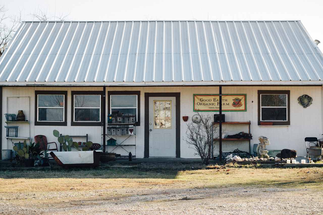 Out front of the farm store. Take a look inside before (and probably after) a night under the stars. 