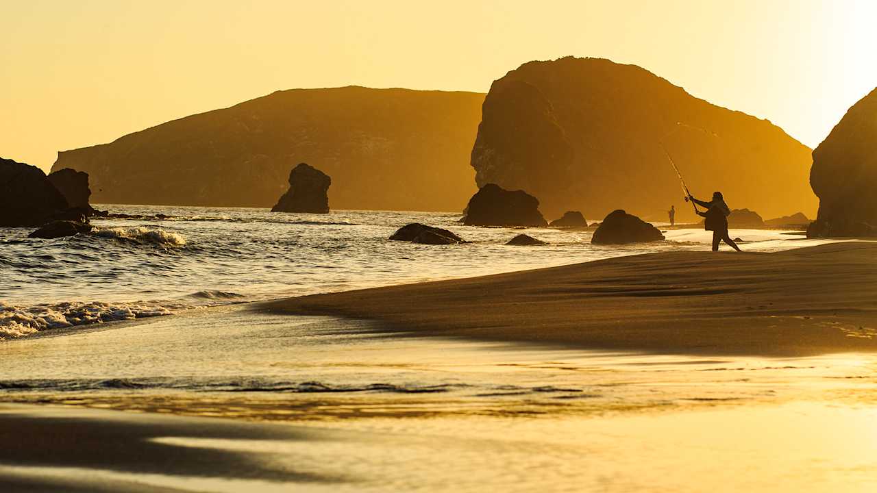 Fishing at sunset at Harris Beach