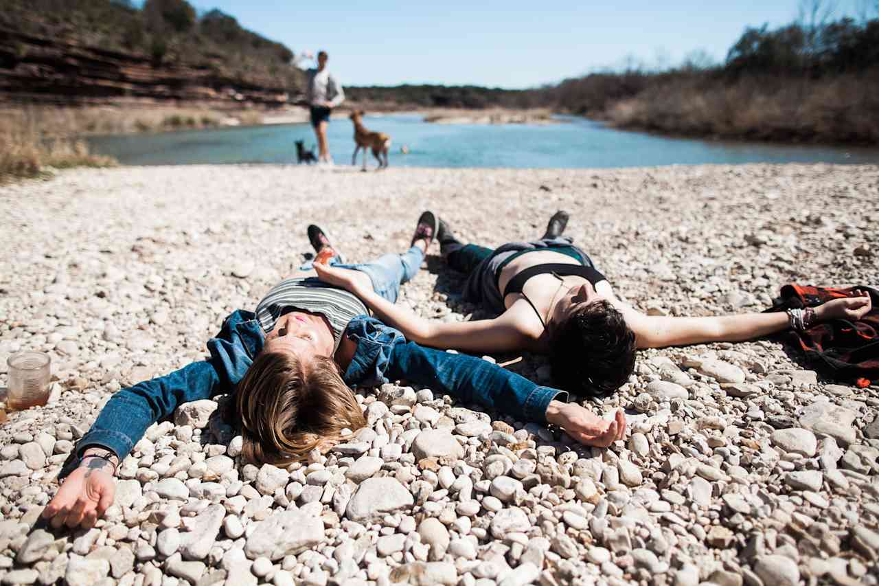 The gravel bar across the river is perfect for lizard-laying after a dip. 