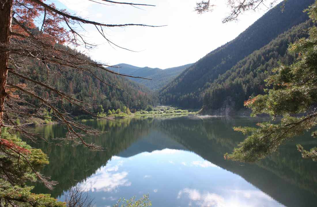 Beautiful lake covered in mist early morning