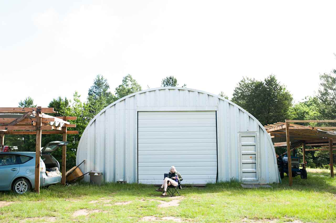 Enjoying some morning sun in front of the Quonset.