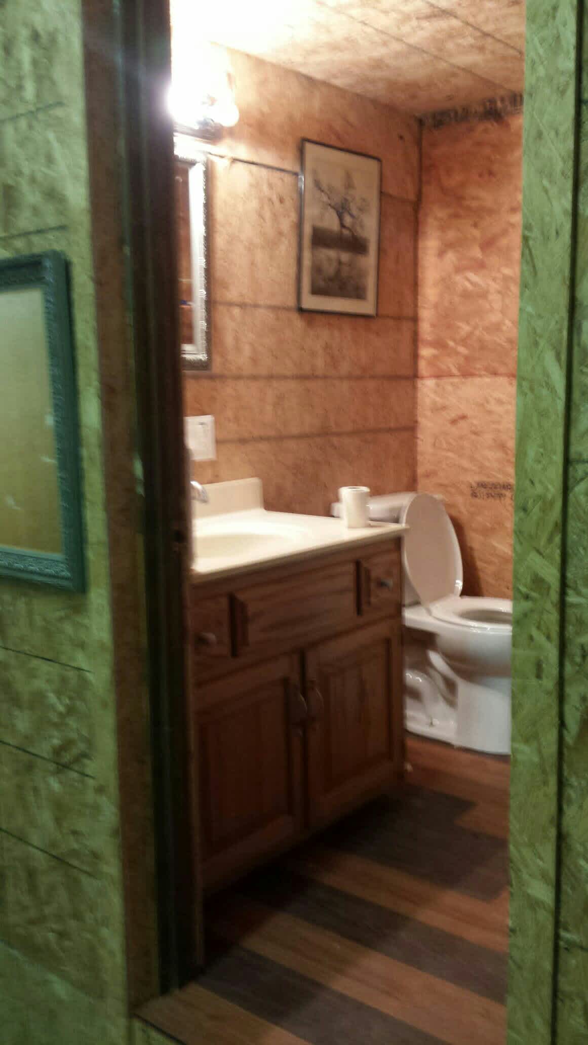 Bathroom in the Hunters' Apartment. There's a shower & 2nd Very Large Sink to the right inside the bathroom. Apartment is on the 200 Acres!! Happy Place :-)