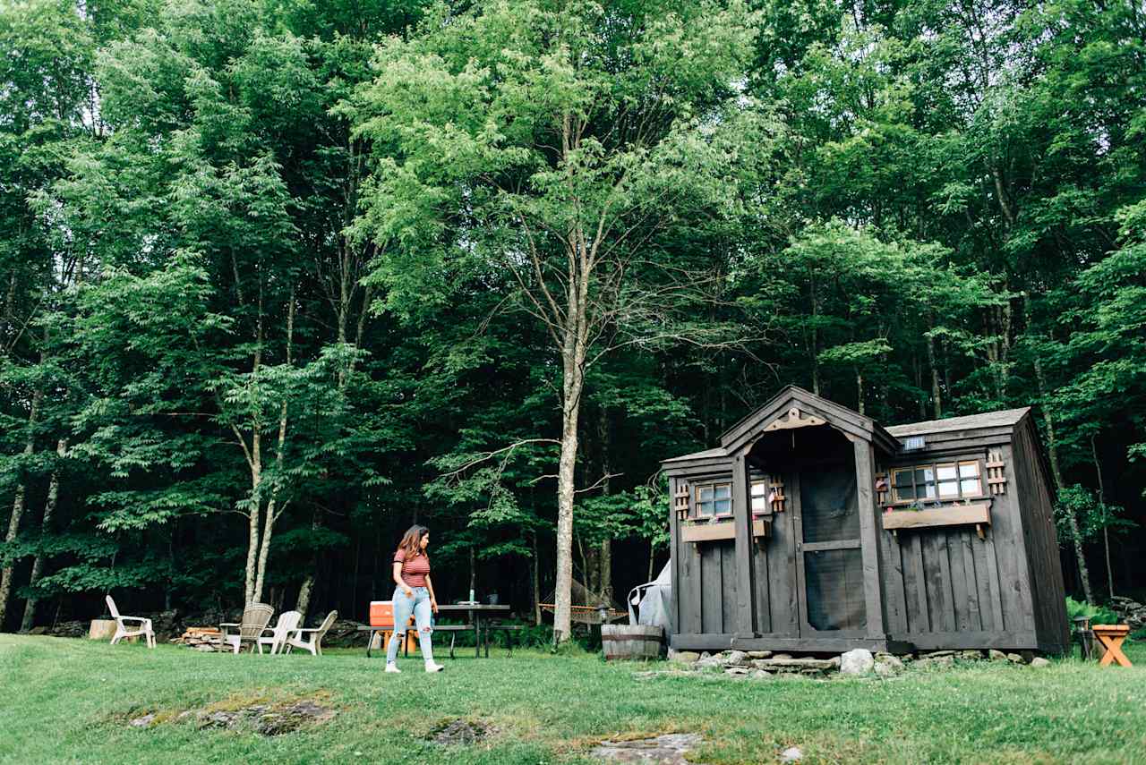 beautiful cabin perched at the forest edge