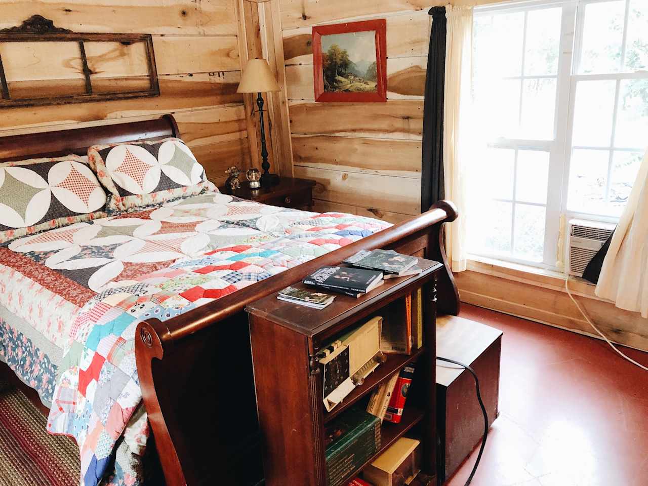 Comfy bed with mysteries by the property owner to enjoy. Air conditioner is right by the bed for staying comfortable in the warmer months.