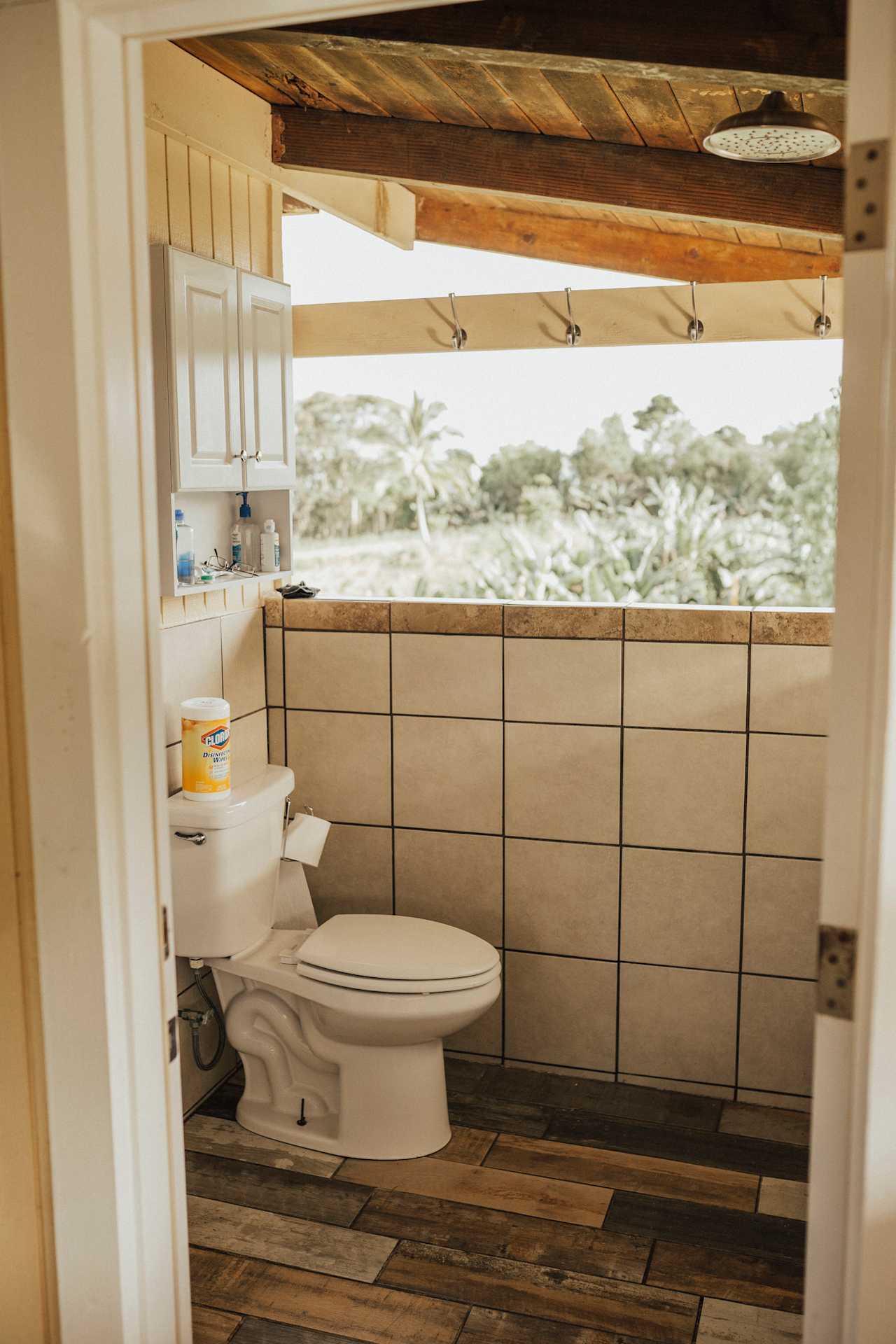 The outdoor bathroom with the most amazing shower! There is another bathroom available inside.