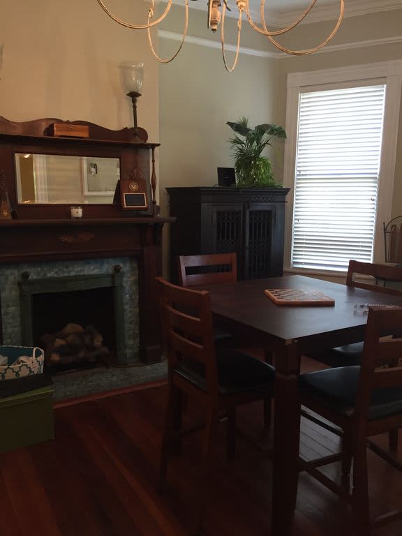 A cool pub table makes a great game area in the parlor.