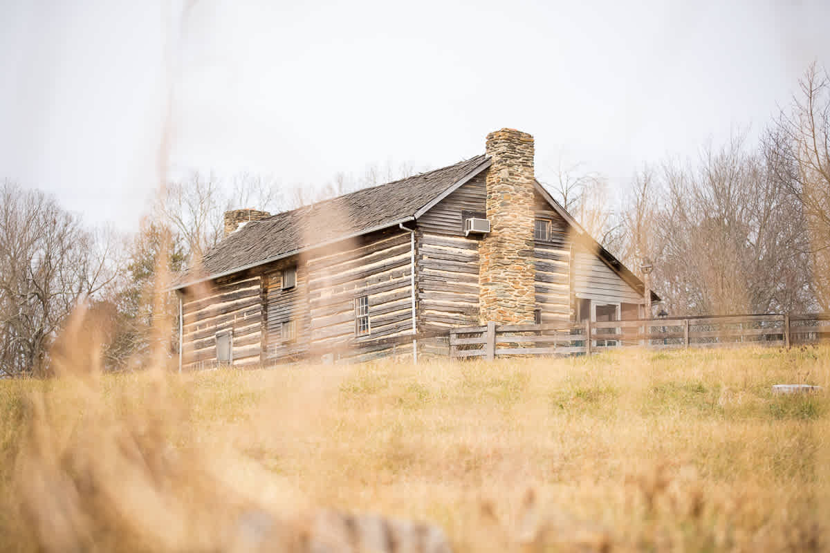 View of the cabin from the field below. 