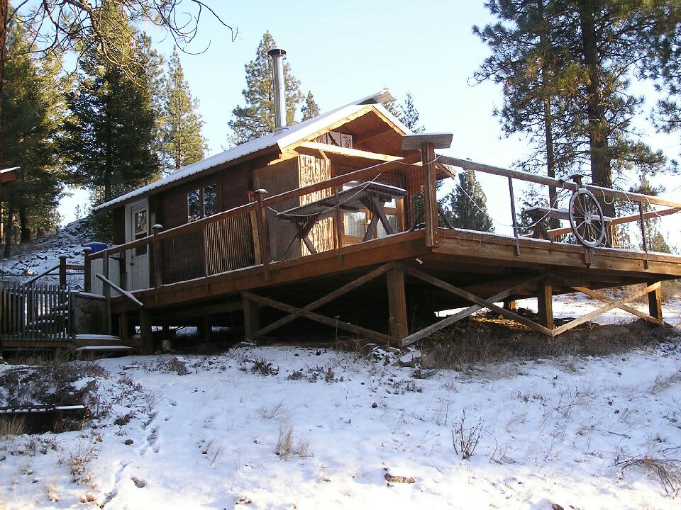 The cabin at campsite 2. Includes private access to the dock, fishing on the Westfork of  the San Poil, 2 outdoor cooking grills, a picnic table, and campfires. 