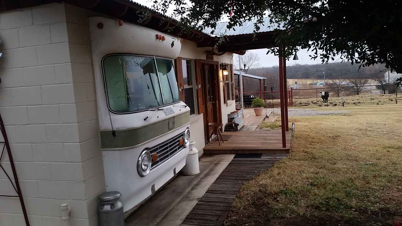 Trickle Creek Ranch headquarters, this vintage Islander motorhome is part of the building.