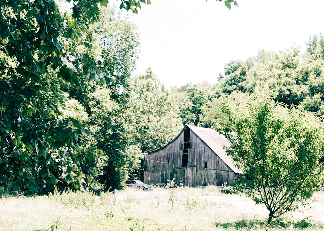 You'll park at the barn and walk to your campsite. 