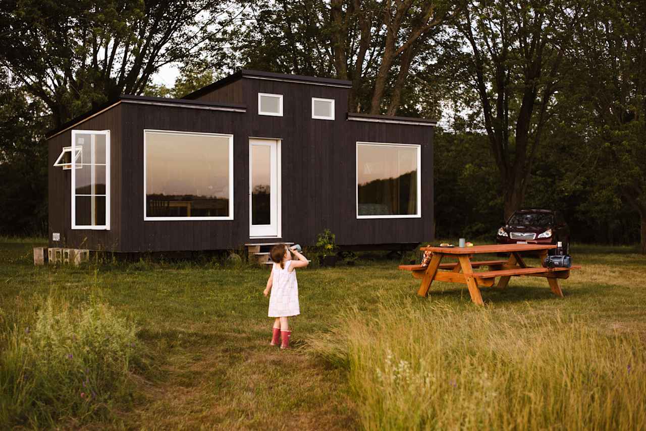 Close easy picnic table that won't leave you far from the indoor kitchen area.