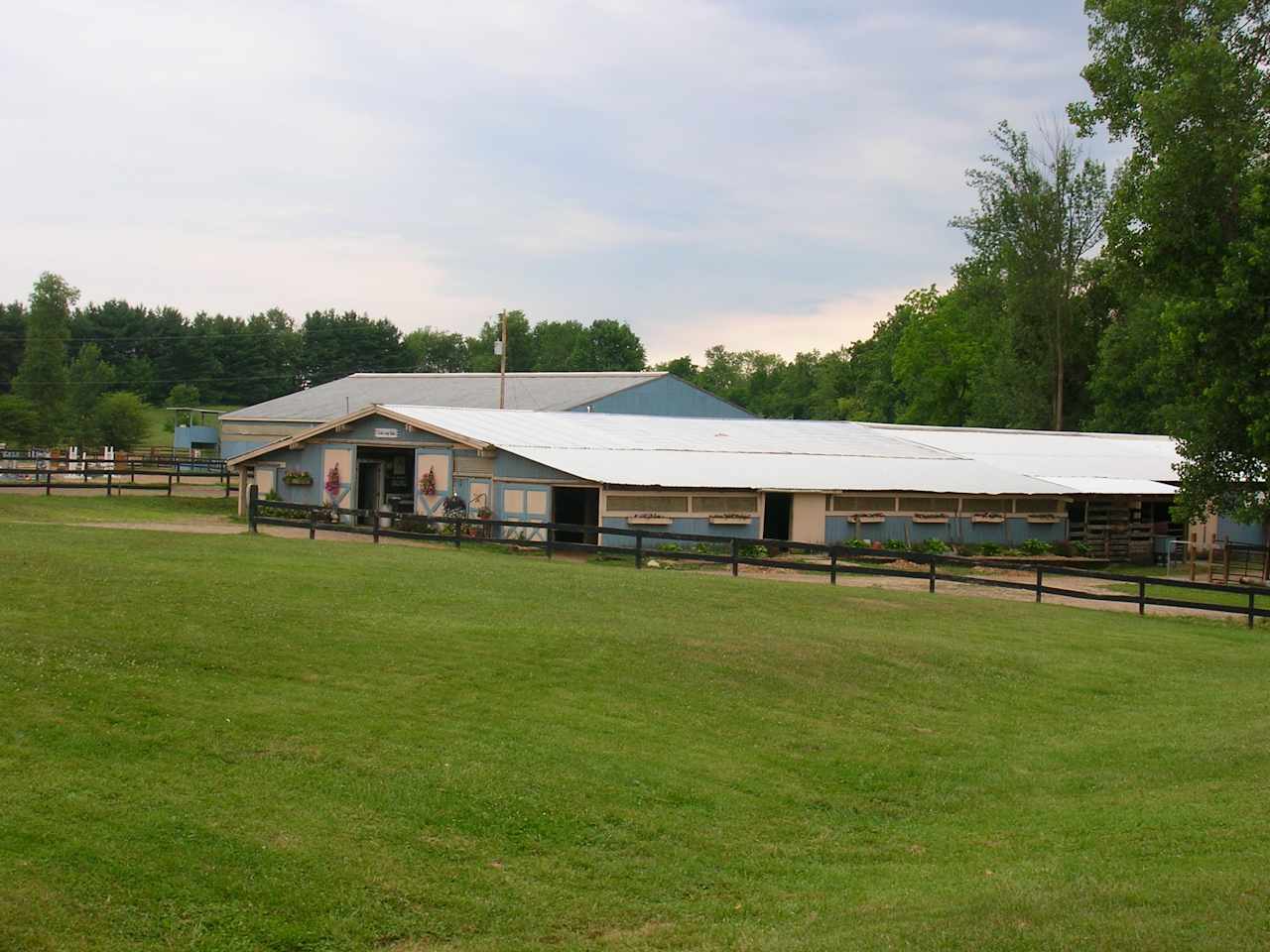 Riding stable that houses 55 horses. 