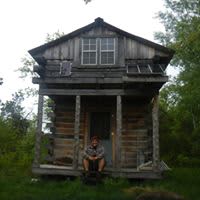 This cabin is available for use; it has a wood cookstove and is quite cozy. It's about 600 feet from the road into the woods. 