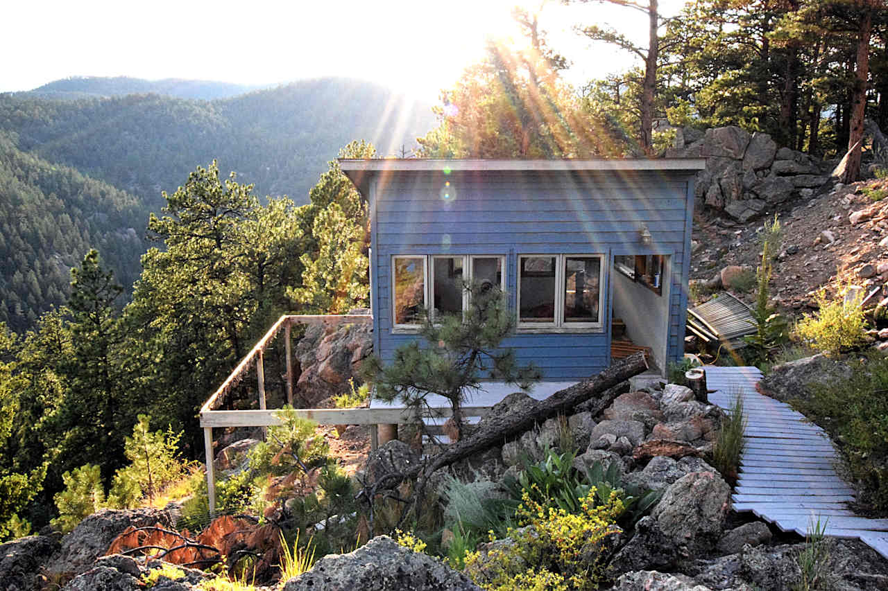 Cabin before the makeover - new deck and paint Aug 2018