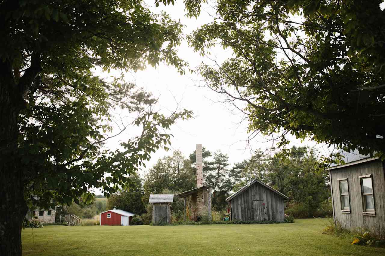 Farm yard camping close to the bathrooms and shower located in the barn.