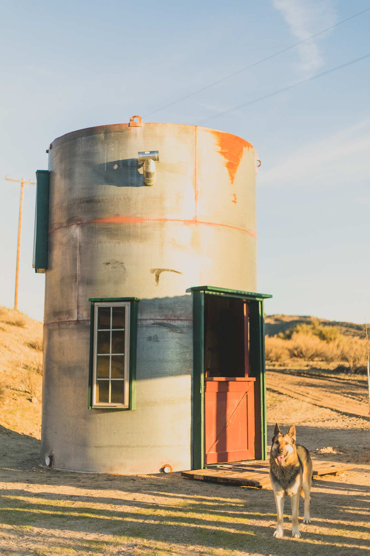 Golden Hour at the Glamp Tank. Truly one of the coolest structures I've seen on Hipcamp—and one of the warmest spots on the property. (You get that late afternoon sun.)