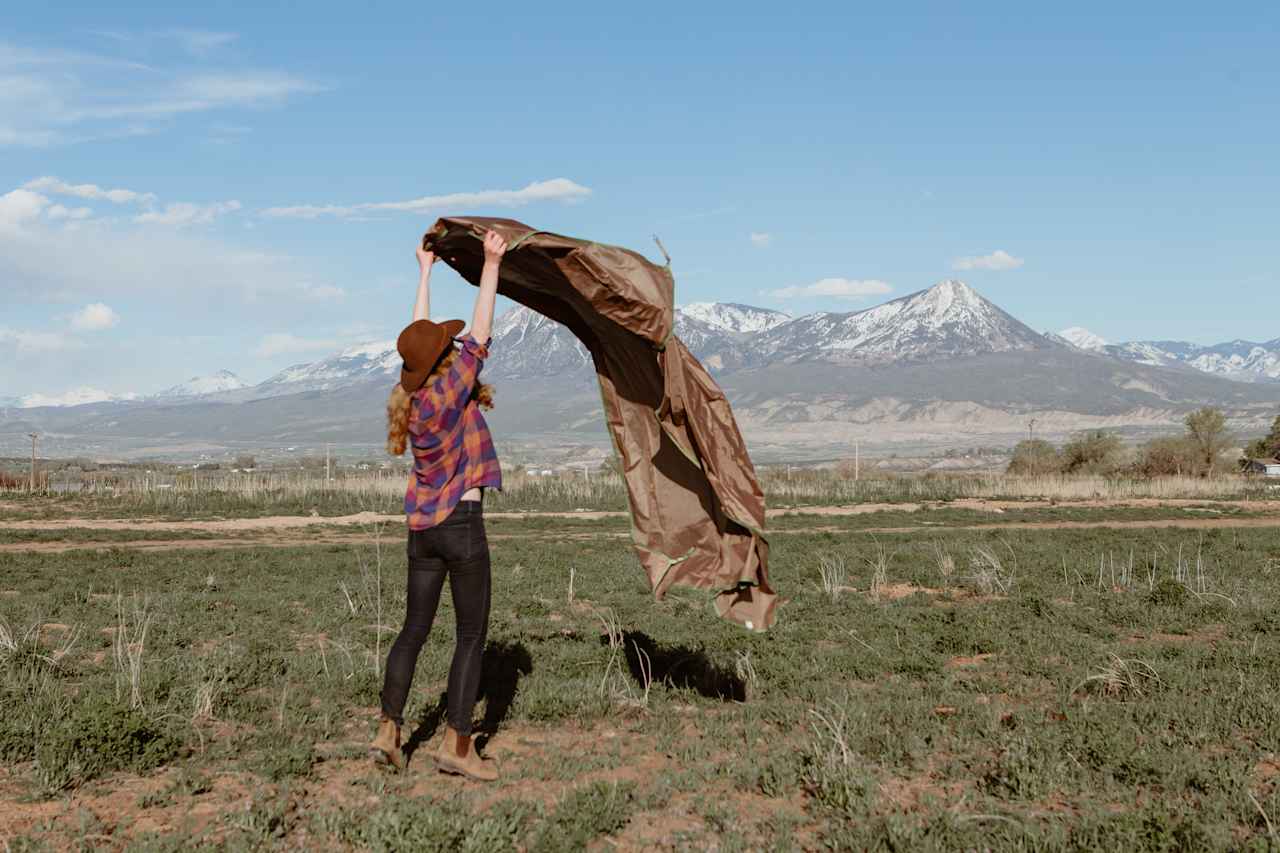 There's tons of flat areas for your tent and Michelle helped me pick out a good spot with this amazing view. Keep in mind there is some small plants and old dried manure in the fields but you can easily find spaces without it or just kick it out of the way.