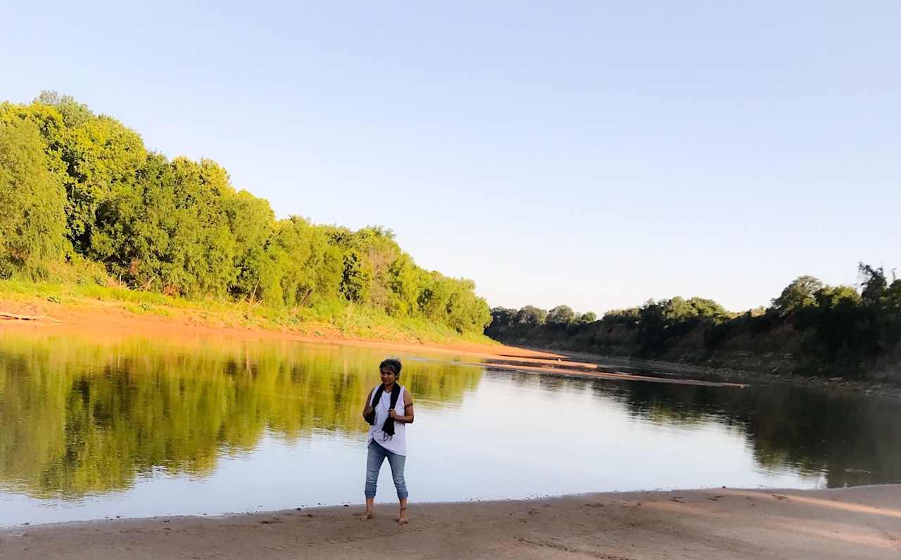 Red River beach walking, sand in your toes, when the river is down.