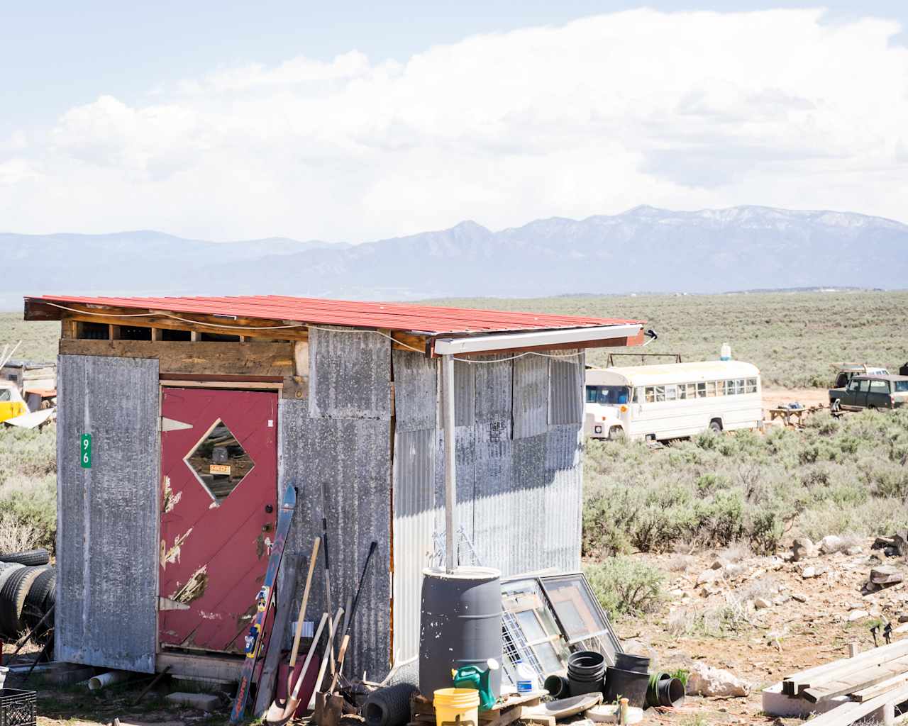 You should be able to see this red roof from the dirt roads to help you find the campsite location 