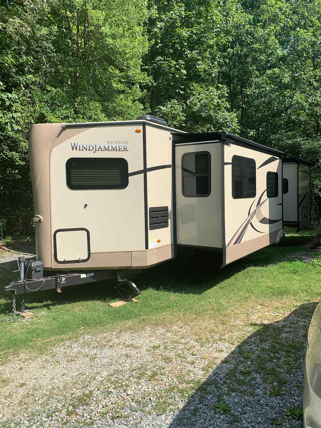 Nestle your RV in by the woods.