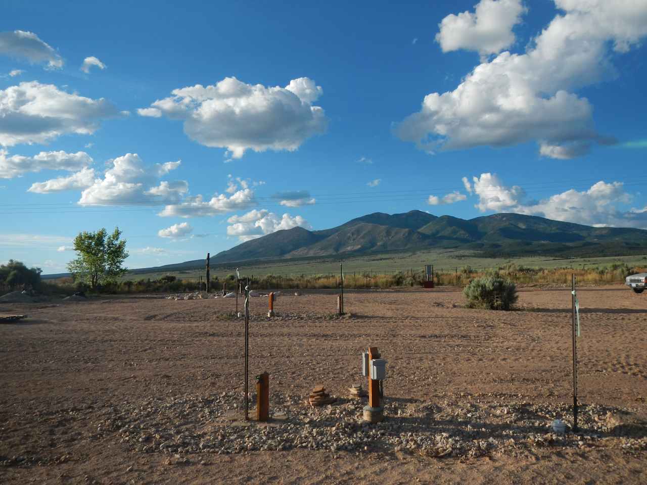 Here is a good photo of the park. Site 4 in foreground with both 50 and 30 amp, and site 3 just beyond it and offset to the left. 