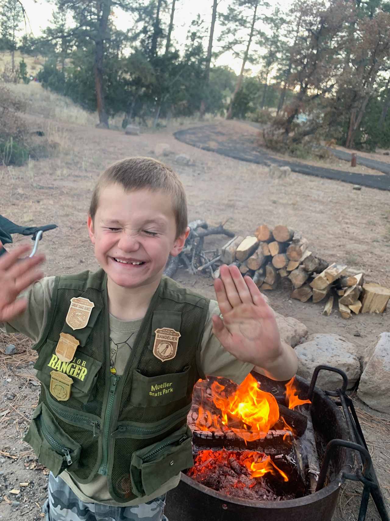 Fire after the junior ranger experience... fresh paved road in background.