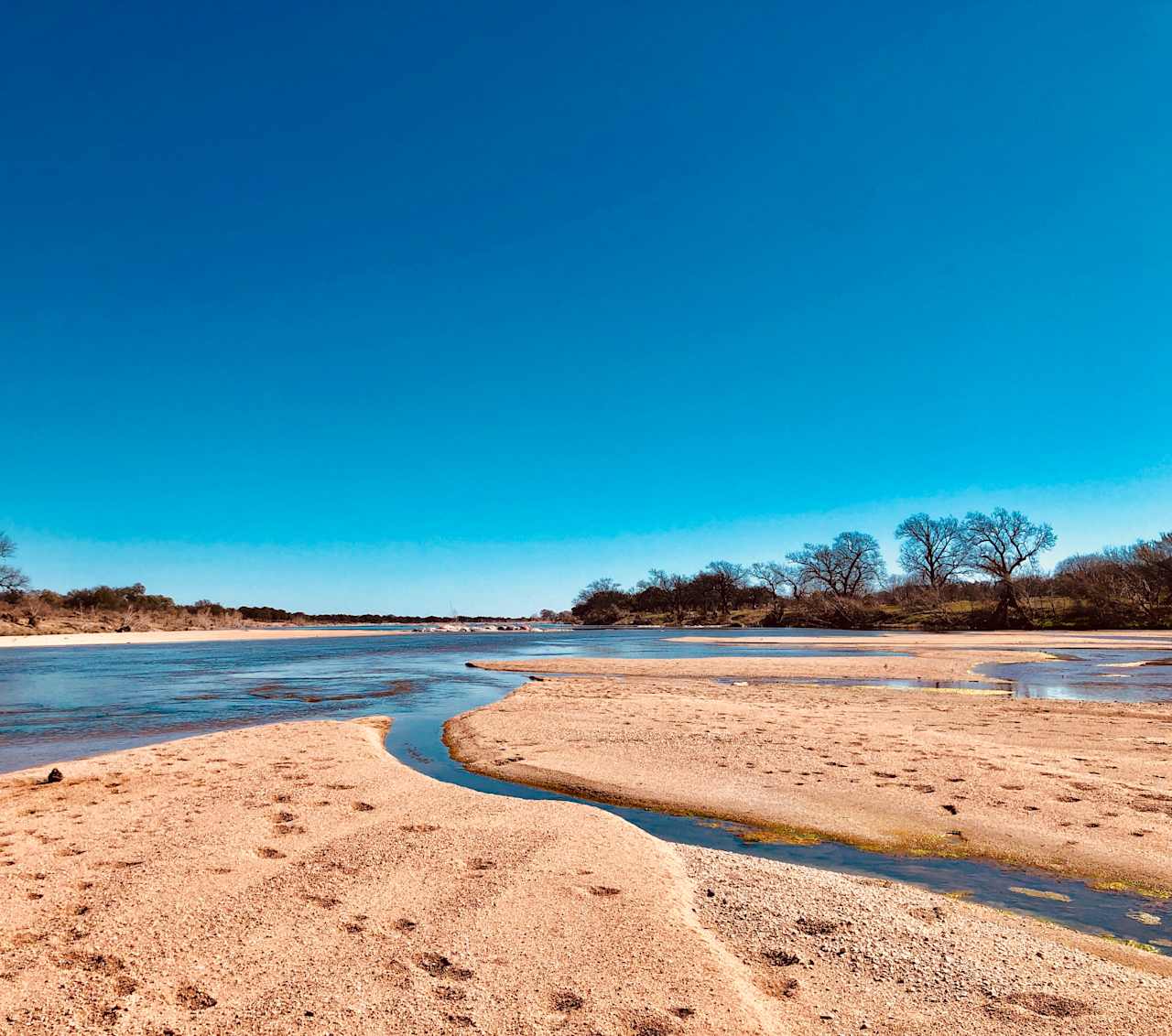 Long sandy beaches and big blue skies directly in front of 500 Waves.