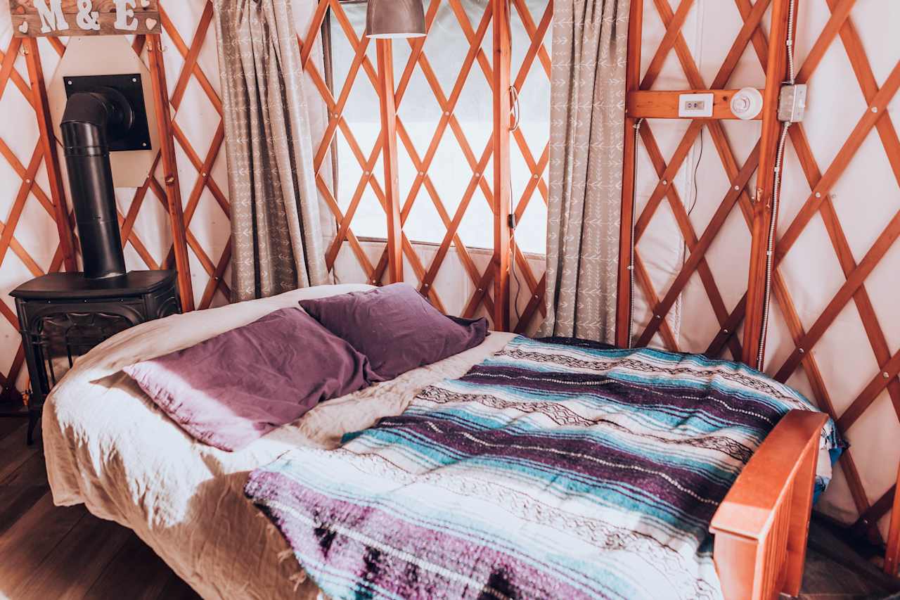 Such a comfy futon bed! It's hut style, so you bring your own sleeping bag and pillow, but the linens you sleep on top of are very cozy and comfortable. 